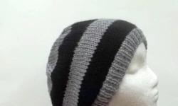 The colors of this hand knitted beanie hat are gray with black stripes, suitable for men or women and teens, fits all size heads, stretches out to 31 inches around.Completely hand knitted. Very comfy. The beanie beret is made with a soft acrylic yarn.