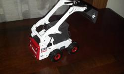 Bobcat S-250 Skidsteer Toy Collectable 1/25th scale, made of steel, very detailed bucket comes off goes up and down, add this to you collection or as a toy for the kid that loves construction toys. 783-2014 Asking $50.00