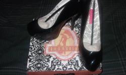 Brand New, never worn pair of patent Bordello shoes. Size 9M. Closed toe platform pumps with stiletto heel and concealed platform.