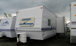 Here is a very nice 26ft camper with a slideout. Its an older model but in nice shape, which means you save money!! It weighs around 6,100 lbs dry. If you don?t have a truck, don?t worry! We will deliver to your house, campground, or wherever you need