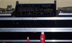 Safely transport, 2 Technics 1200 style turntables and your 19 inch rack mount DJ mixer, to and from gigs. The turntables fit in standard position. This Calzone flight case is black laminate over 3/8 inch plywood. It has aluminum corners and edges and a