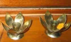 Purchased in Jerusalem, Israel over 40 years ago:
Pair of SILVER METAL FOLDING CANDLE HOLDERS with 6 folding petals to hled tapers. 2" high. Great if traveling. $10 the pair
See my separate ads for other items from Israel, Judaica
...art works from the