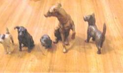 Collection of miniature dog?s 1 cat metal small few inches
High all in good shape except 1 has a leg missing poor thing
They are all over 40 years old so considered antique perfect
For animal lovers and cute. The price is open to your discretion
For you