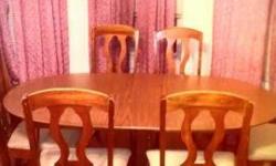 GORGEOUS solid wood Dining Room set with 6 chairs that have cream colored cushions. In GREAT condition! Would enhance any room.
Table has a center leaf which can be removed to shorten the length of the table and replaced to lengthen at any time.
Must be