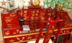 Oreintal desk .Has glass top comes with matching chair . Has laquered finish . with gold leaves embossed . very beautiful desk . paid over $1000 dollars will sell for $625.00 cash call if interested 315-232-4112 located in adams ny south of watertown ny .