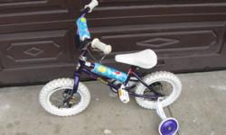 This is a Disney Little Mermaid Girls Bike 12" Bicycle with training wheels. It's made by Dynacraft who is one of the largest makers of bicycles in the world.
The bike is in good shape as pictured and has a coaster style brake (you pedal backwards to