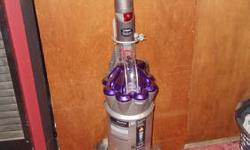 HERES A DYSON DC17 "ANIMAL" VACUUM CLEANER..ITS IN EXCELLENT CONDITION AND WORKS PERFECTLY..IT WAS JUST FULLY FACTORY SERVICED IN JULY OF 2012,THEY REPLACED THE BELT AND CHECKED EVERYTHING..THIS COMES WITH ALL THE OPTIONAL ATTACHMENTS (worth the asking