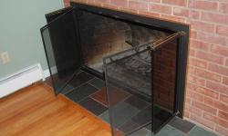 Fireplace doors - bifold glass doors, solid screen doors, adjustable air vent on bottom. Dimension of outer frame is 54" wide by 32" tall. Includes grate to hold logs.
