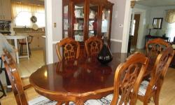 Furniture - Solid Oak Dining Set Table/ 6 Chairs And Big Hutch
The dining room set is for sale for 1100.00 or best offer, is 15 years old; but, is in a very good condition, and the value when new was 3,500.00.