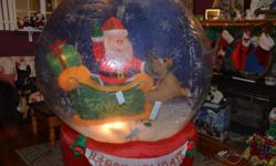 Let It Snow 6' Inflatable Snow Globe with Santa and Rudolf that lights up and blows the snow continuously around.
Indoor/Outdoor..
Aside from 3 little tears that are covered with duct tape, see pictures, which do not affect its function.
I do not have the