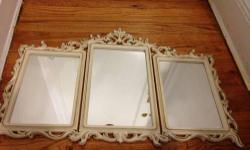 Gorgeous vintage Mirror!! White frame with golden accents. 3 panes with hooks on the back. Can be folded. Awesome piece!
This ad was posted with the eBay Classifieds mobile app.