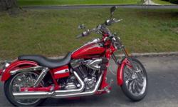 Driven only 2100 original miles this limited edition HARLEY DAVIDSON screaming eagle dyna fxdse with over $15,000 in performance parts and upgrades using the latest technowledgely , a show bike that can be driven on a daily basis. Here is a chance for
