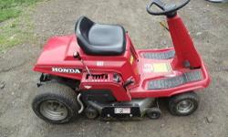 HERES A HONDA 3011 REAR-ENGINE RIDER..ITS IN EXCELLENT CONDITION AND HAS BEEN METICULOUSLY MAINTAINED..CHANGED THE OIL,REBUILT CARB.. BRAND NEW BATTERY,GOOD TIRES ECT..THIS COMES WITH THE MULCHING KIT AND BLADE,I HAVE THE MANUAL FOR THE MULCHER BUT NOT
