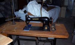 Singer Model 31
Manufactured 3/3/1950 Elizabeth, NJ
in stand with one drawer.
Brand New belt, feed dogs, faceplate and professionally inspected & oiled
Includes attachments, button holer, bobbin holders, needles, etc.
Runs like a charm