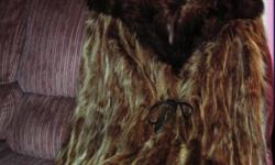 Pre-owned: An Item That Has Been Used Or Worn Previously.
Give Your Girlfriend, Friend, Wife, Or Yourself A Beautiful fur coat...Make Someone Or Yourself Feel Special For Only $300.00 "don't miss out on this great deal" Pictures are not very good but the