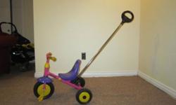 Kettler Tricycle
Adjustable height push bar included
The push bar can be removed easily as soon as your child is ready to pedal on his own.
The trike is also equipped with a fun rear-tipping yellow bucket that is great for both carrying and collecting
