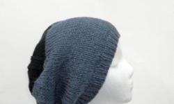 This knit beanie slouch is knitted with soft wool and acrylic yarns. The colors are denim blue and black. This beanie is a medium thickness, very stretchy, will fit any head, stretches out to 31 inches around. The measurements are lying flat on a table,