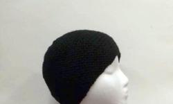 A very comfortable and warm skullcap beanie. Worn by men, women and teens. No brim skullcap. The color of this skullcap beanie hat is black. It is made with a soft acrylic yarn. Loose fit. Very stretchy, will fit any head, stretches out to 28 inches