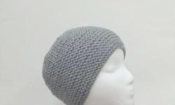 Worn by men, women and teens. No brim skullcap. A very comfortable and warm skullcap beanie. The color of this skullcap beanie hat is gray. It is made with a soft acrylic yarn. Loose fit. Very stretchy, will fit any head, stretches out to 28 inches