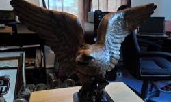 Vintage Large Eagle Sculpture weight almost 19lbs. Look at pictures very closely, I am not sure what this is made out of, I believe its possibly some form of ceramic, not really sure, very heavy. Very Nice looking Eagle. Made sometime in 1930"s or 40's.
