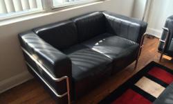 This modern, designer Le Corbusier style LC3 love seat sofa is in excellent condition, looks great, and is very comfortable.
It's not made cheaply like most other imitation designer couches.
Delivery could be an option depending on your location. Contact