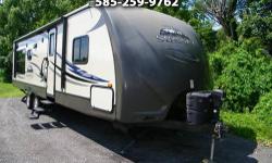 Here is the nicest camper I have ever had here. This is a crossroads 30 FT travel trailer that is just amazing. It comes with power hitch, power awning, fireplace, power stabilizers, TV that goes into a cabinet. If you buy one of these brand new it'll
