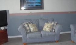Denim blue over-sized sofa and love seat including matching throw pillows. Very Good Condition. Make an offer!!