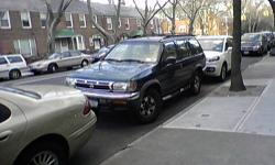 1997 NISSAN PATHFINDER SE 4 doors, automatic power windows sunroof 2nd owner never in accident, 90k miles runs good needs some polish