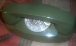 Western electric brand. Still in original box. Rotary dial .White. Mint. Never used ; still in box