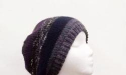 This knitted purple and lavender hand knitted beanie beret hat will keep you warm this winter. This beanie slouch colors are navy blue, lavender, purple and navy. A warm beanie. The beanie beret is made with acrylic 80% and wool 20%yarns. Very stretchy,