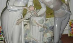 PRODUCT DESCRIPTION AND FEATURES:
Sometimes used as a wedding cake topper according to Peggy Whiteneck's Second Edition Collecting Lladro Identification & Price Guide, this beautiful porcelain figurine is called Wedding. It features a young groom looking