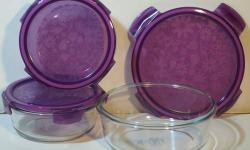 1 container is approx. 8" x 5" x 3"
the other is approx. 6" x 4" x 2"
clear glass bottoms
translucent purple tops
dishwasher, microwave safe
no chips or cracks