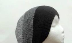 The colors in these stripes are black, dark gray and light gray. This wool hat is made with a soft 100% pure new wool yarn. Completely hand knitted. Worn by men and women. It is a medium thickness, very stretchy, will fit any head, will stretch out to 31