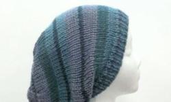 The colors of this slouch hat are blue, green, grey, dark blue. Knitted in stripes. This slouch hat is made with acrylic and wool yarns. Very stretchy, will fit any head, stretches out to 31 inches around. Suitable for men,women and teens. The