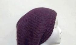 This is a beautiful purple called "eggplant". A hand knitted sllouch made with a soft acrylic yarn. One size fits all, very comfortable. Completely hand knitted. Worn by men or women. The measurements are lying flat on a table. Across the brim or ribbing