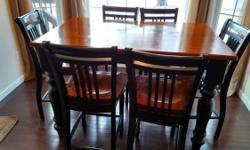 Beautiful solid wood 7 piece set purchased from Millspaugh Furniture in Walden, NY. Black & dark wood finish. Seats 6 comfortably. Comes with extension leaf. In excellent, solid shape. Paid over $2500. Must be able to pick up. Asking $1100