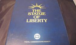 This is three Statue of Liberty Centennial Commemoratives. First is the U.S. Postal Commemorative Society's stamp collection of 11 uncanceled mint stamps from 1940-1978 (3 are Air mail) 1 First Day of Issue stamp of F.A. Bartholdi, Statue of Liberty's