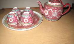 ceramic with embroidery chinese tea pot, cups and tray new .
cash and carry