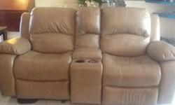 All leather, tan/camel, rocker-recliner duo. Featuring separate reclining positions for each chair, 2 cup holders and storage for your remote, glasses, etc. Just purchased this summer. Like new condition. No smoking home. Paid 1400...asking 800
Must see!
