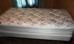 Therapedic Medi-Coil Plush Twin Bed used less than a year (upgraded to a queen) No rips, stains, or damage. Includes mattress, box spring, and metal frame. Currently being unused stored in plastic wrap. Clean, smoke-free home. Will deliver in Jamestown