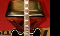 Excellent condition, few scratches or play-wear.
Made to play the blues, the Epiphone B.B. King Lucille Electric Guitar features 2 humbuckers with stereo output to two separate amps and a Varitone control that tailor your pickup sounds. The body is