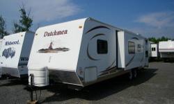 This Dutchmen would be prefect for a big family. It has a queen bed in the front and quad bunks in the back. With the slide out, the inside opens up really nice, so its not cramped up inside. It weighs around 7,200 lbs dry. If you don?t have a truck,