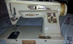 Vintage Singer 503A Rocketeer Slant-O-Matic Sewing Machine For Parts or Repair
Made in the early 1960s
1961 Singer 503A Slant-O-Matic, called the "Rocketeer" for it's groovy design. Was the second down from the top, the next one up was the 500a, it was
