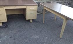 Are you looking for a office furniture that's virtually indestructible? If so, you can't go wrong with a metal tanker desk or tanker table. The industrial, Mid-Century design works well with a retro, modern or even rustic decor.
Tanker Desks ($350 each),