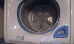 Top of the line Used/Like New White Samsung High Efficiency Top loader Washer and Front Loader Dryer for sale! Excellent condition minus small dent on top of the dryer from storing folded clothes, as seen in the picture. I am in love with this set but am