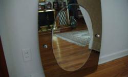 Rectangular wall mirror - beautiful contemporary style - made of excellent quality glass. Great for any room.
Measures: 23-1/2" wide x 31-1/2" high
Oval within measures: 15-1/2" wide x 23-1/2" high
