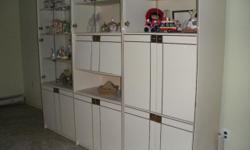 Lighted Glass/Formica Wall Unit
Includes.
5 Curios
3 Units 301/2 X 381/2 High X 171/4 Deep
2 Units 20" wide X 381/2 high X 171/4 Deep
