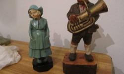 Wooden statues German man playing a tuba a woman dressed
In a sort of farmers outfit. One damage on tuba players hat a part
Missing. Man about 8 inches high woman about 6 inches high.
Been in the closet 40 years so antique I suppose. Price is open
To your