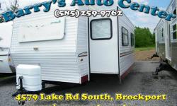 This is a 37ft monster camper that would be great for a permanent site, or you could tow it with the right truck. It has a slideout, sliding glass doors, and is huge inside!! If you don?t have a truck, don?t worry! We will deliver to your house,