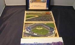 These are Yankee collectibles, some vintage! #1 NY Yankee Authentic Dirt from Yankee stadium w/COA from Steiner plus 3 post card of the new and old stadiums. First post card is from 1942 w/1 cent stamp of the largest Baseball Park in the US at that time,